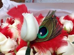 rose and peacock buttonhole